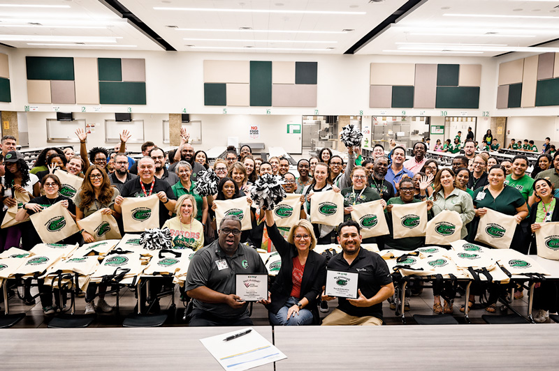 Vivid Customs team visiting Campbell Middle School for Adopt-a-School partnership announcement